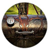 Close-up of a black WoodFiredGrille cover with rust colored artwork of a buck skull with antlers